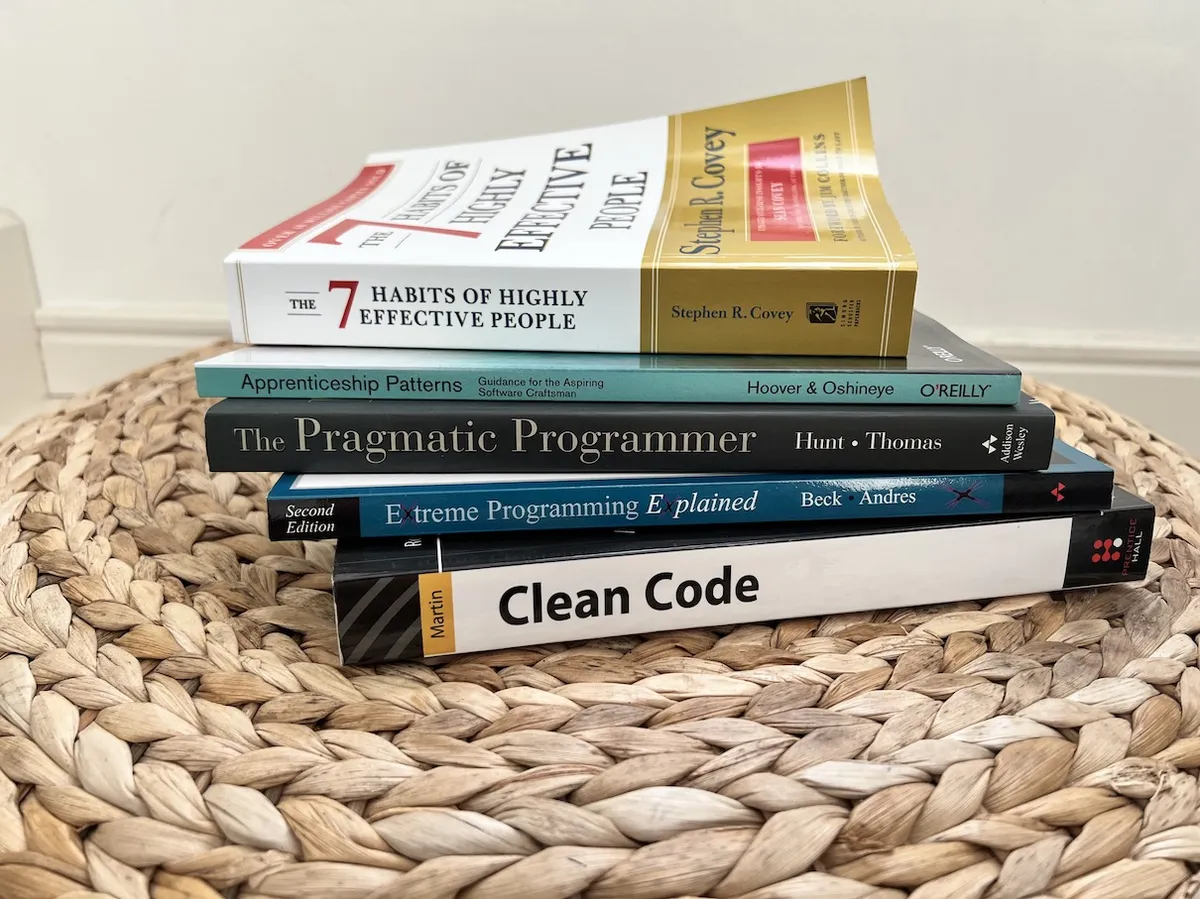 Five recommended books shown from the side