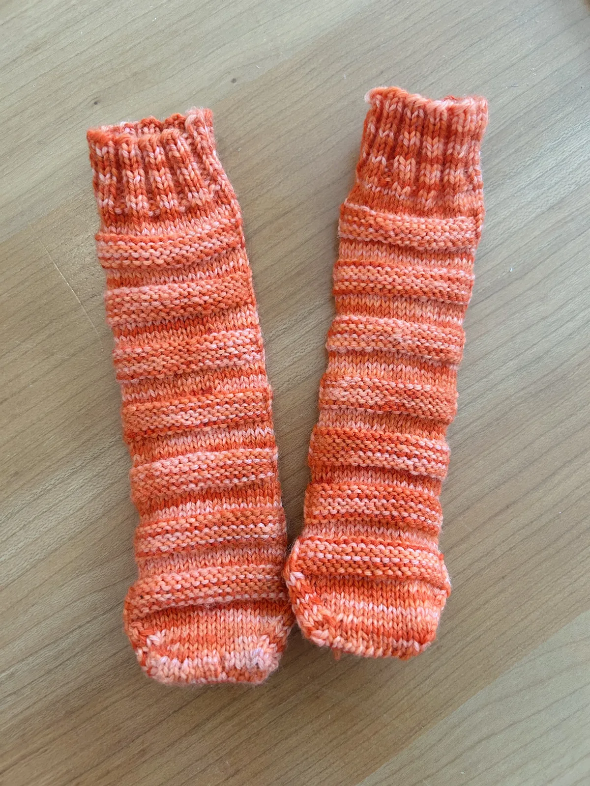 Orange socks, baby sized