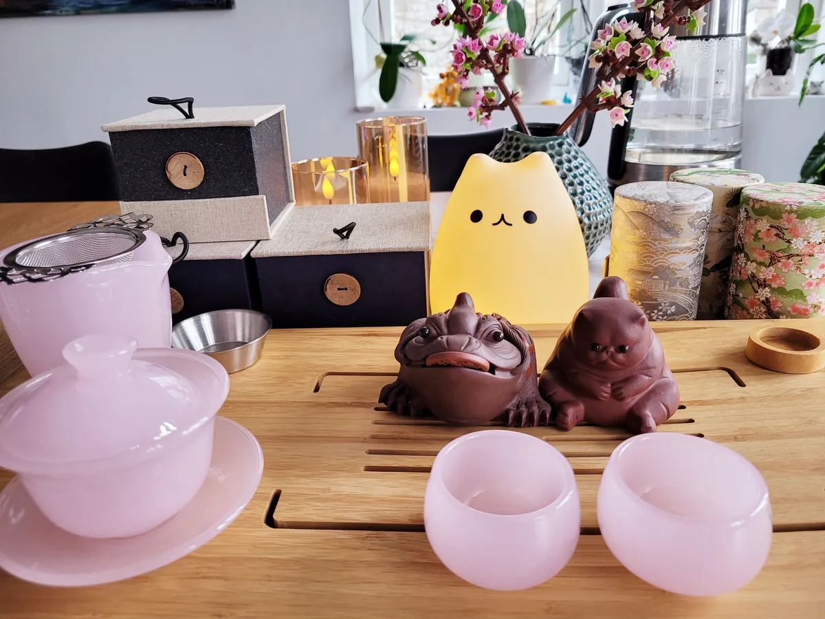 My full gongfu cha set: tray, pottery, mascots and a few tea jars.