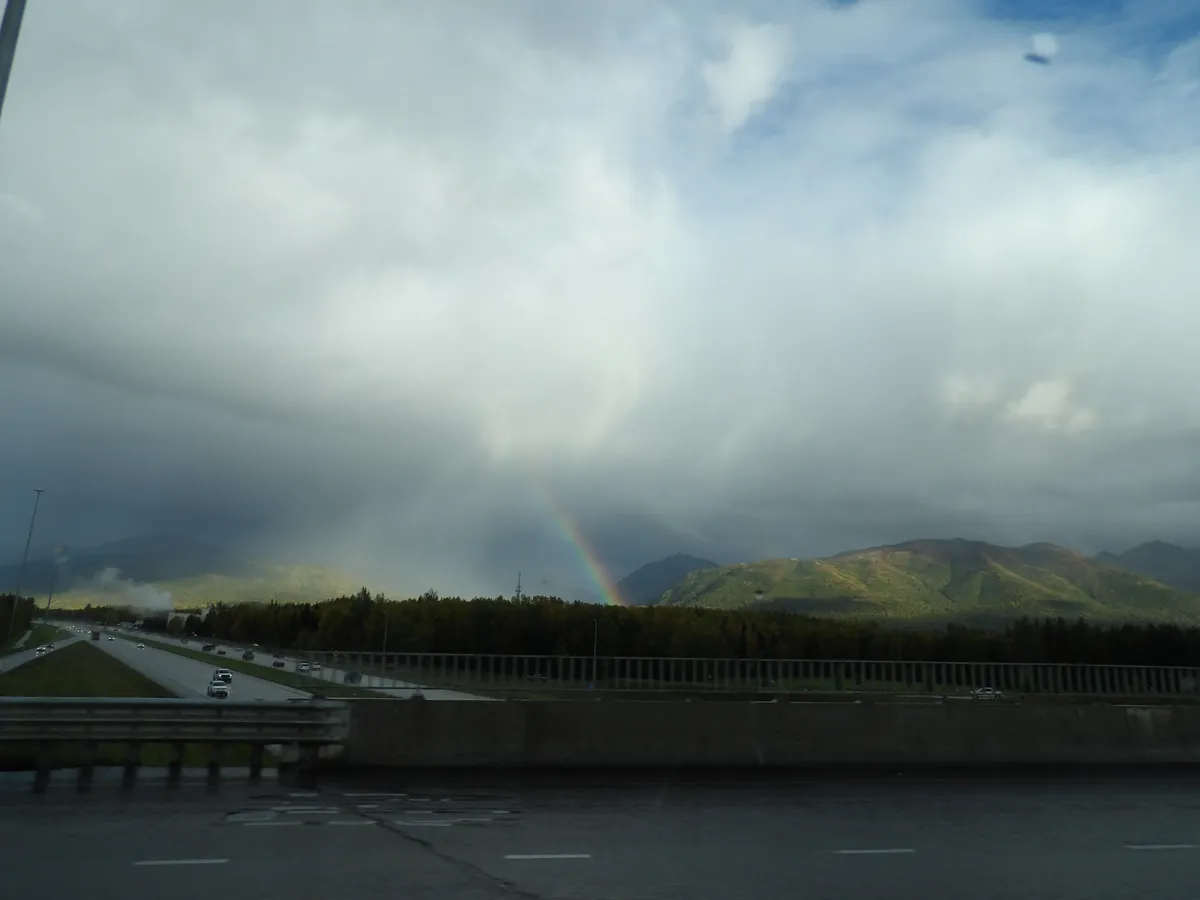 sunset rainbow mountins
