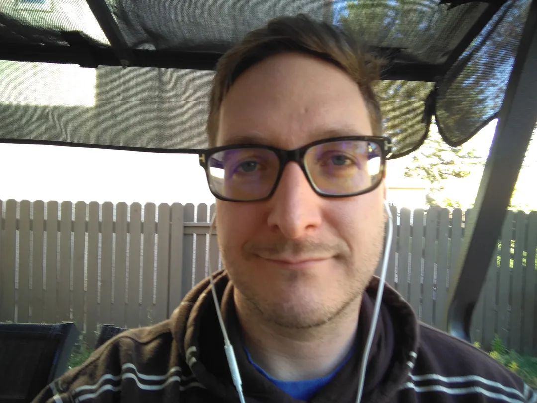 A person wearing earbuds