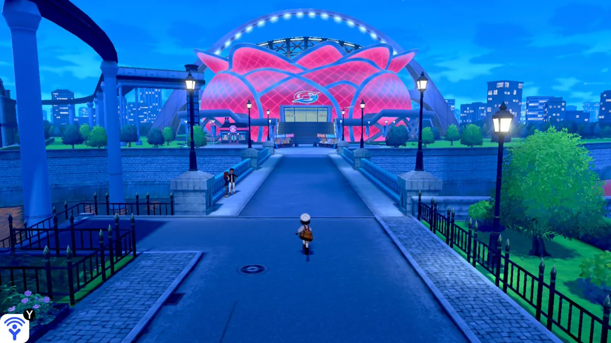 Pokemon Sword & Shield character running towards gym