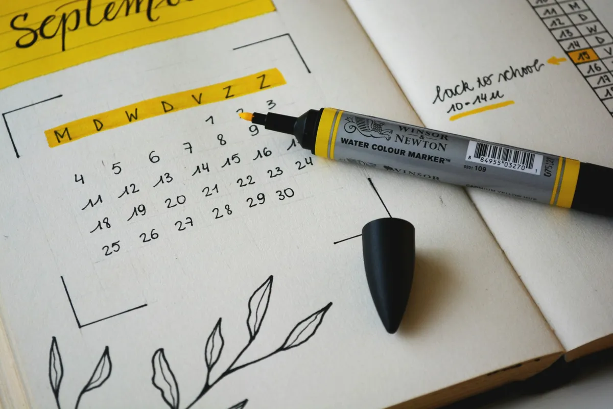 Black Marker on Notebook