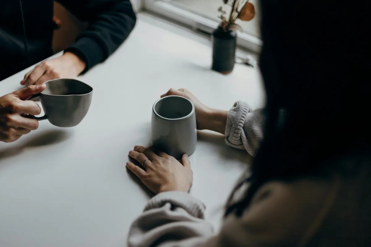 Woman Holding Mug
