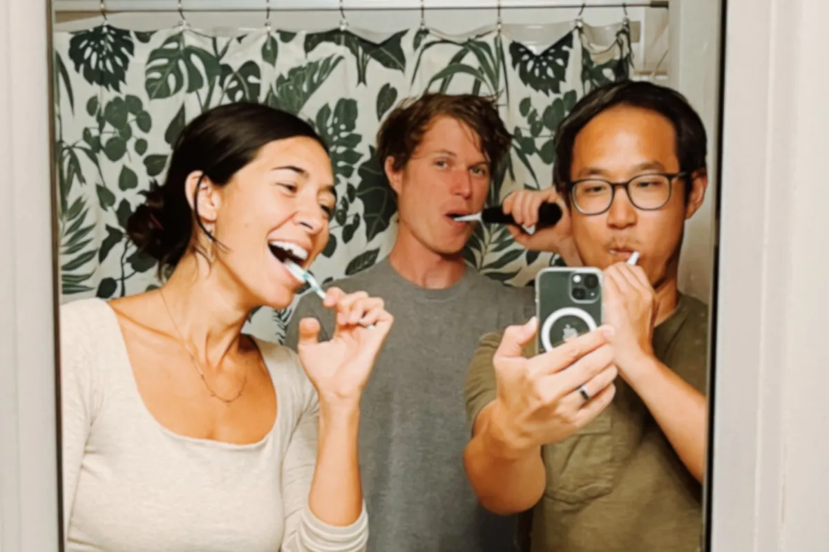 Brushing our teeth in a bathroom in Colorado