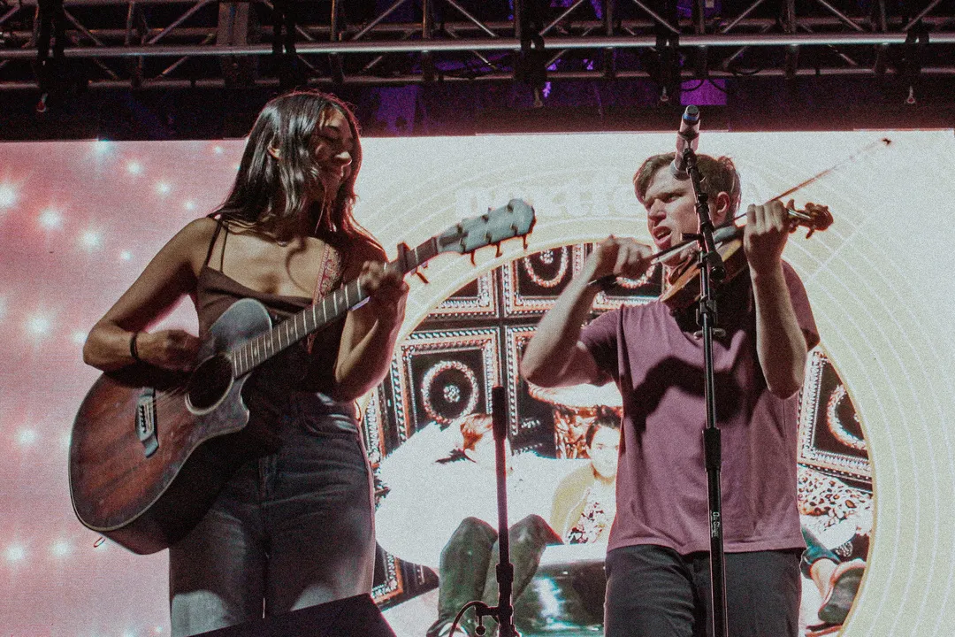 20250512 Clara and Jon rocking out on stage