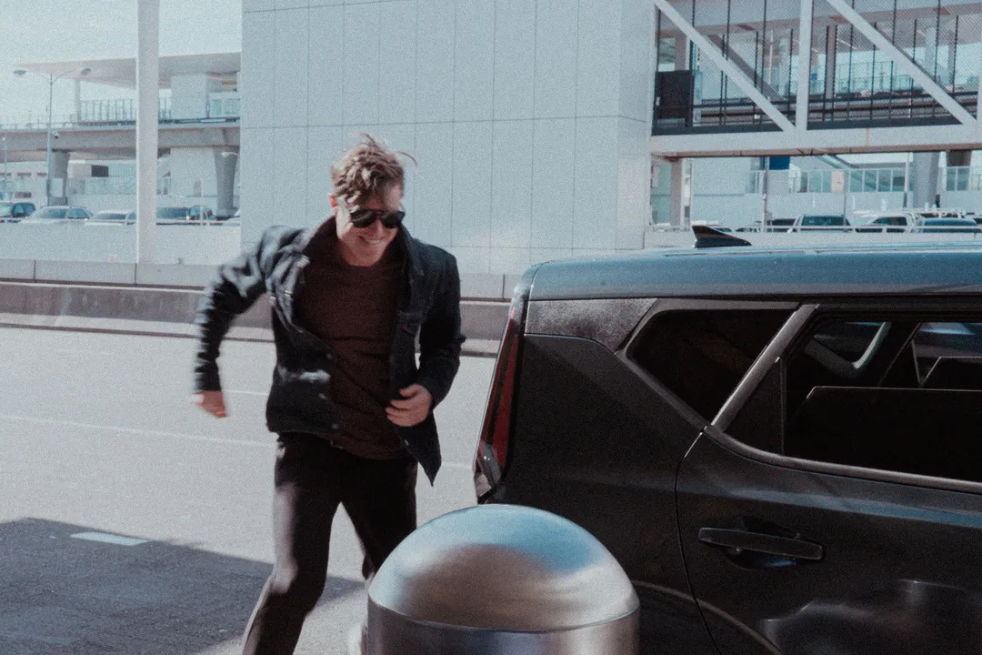 20250512 Jon excitedly running out of the car