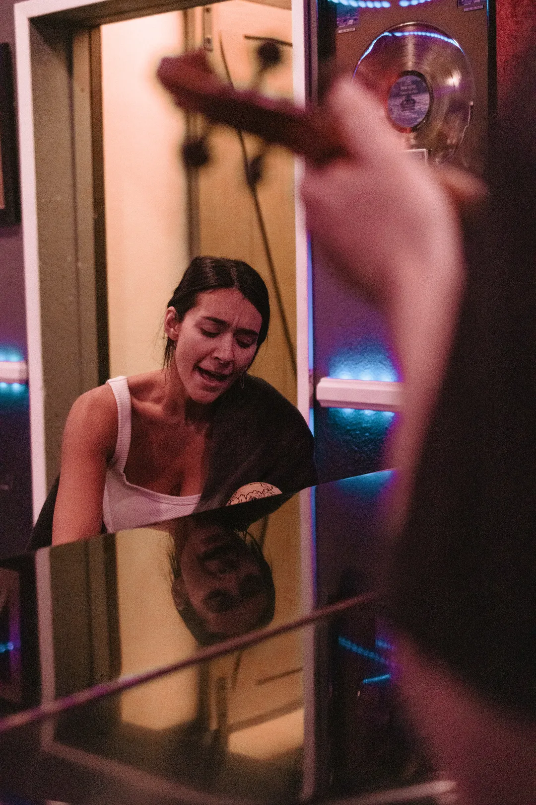 20250908 Clara singing and playing on a piano while Jon is strumming a violin