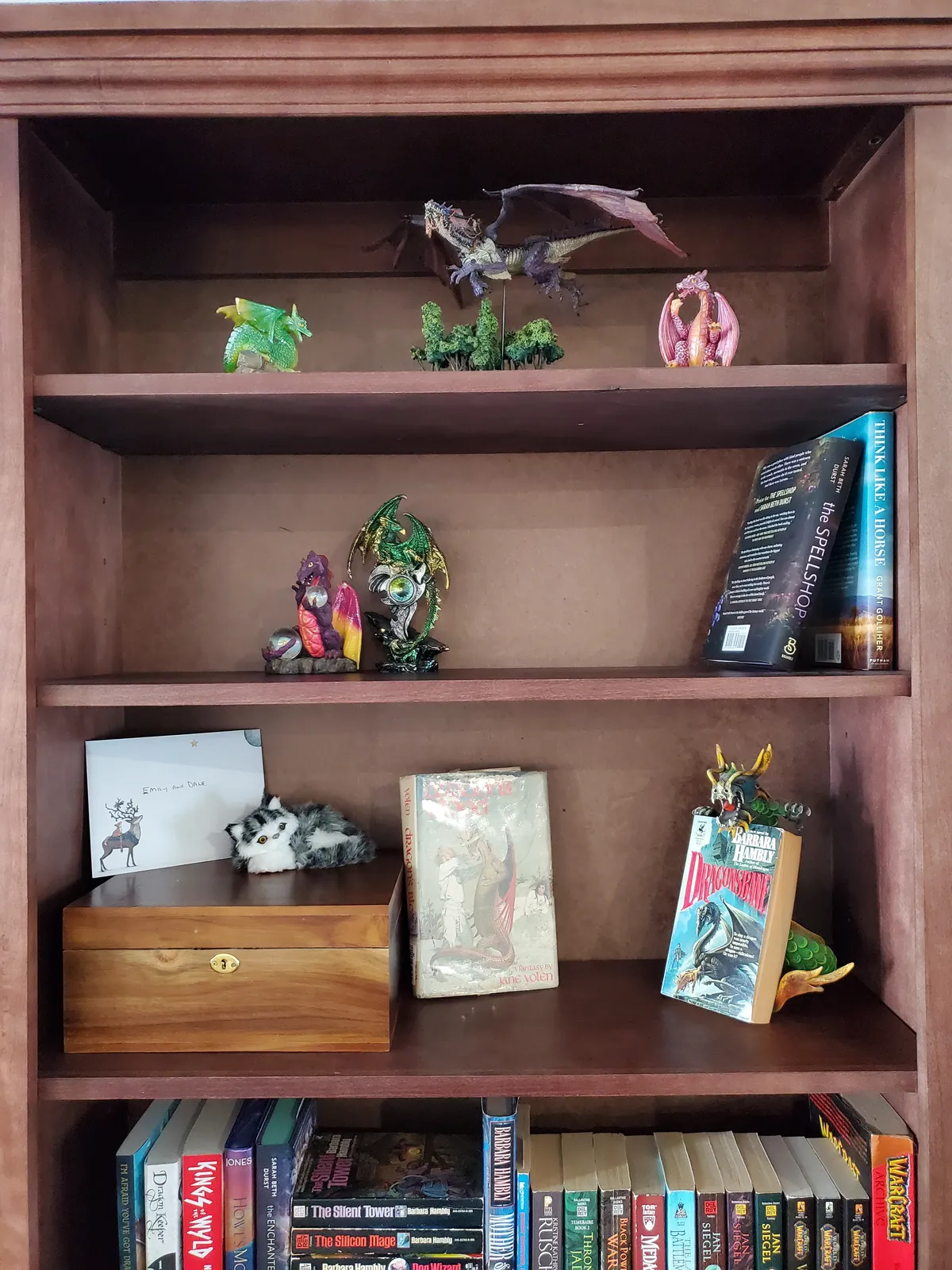 Top of the bookshelf.