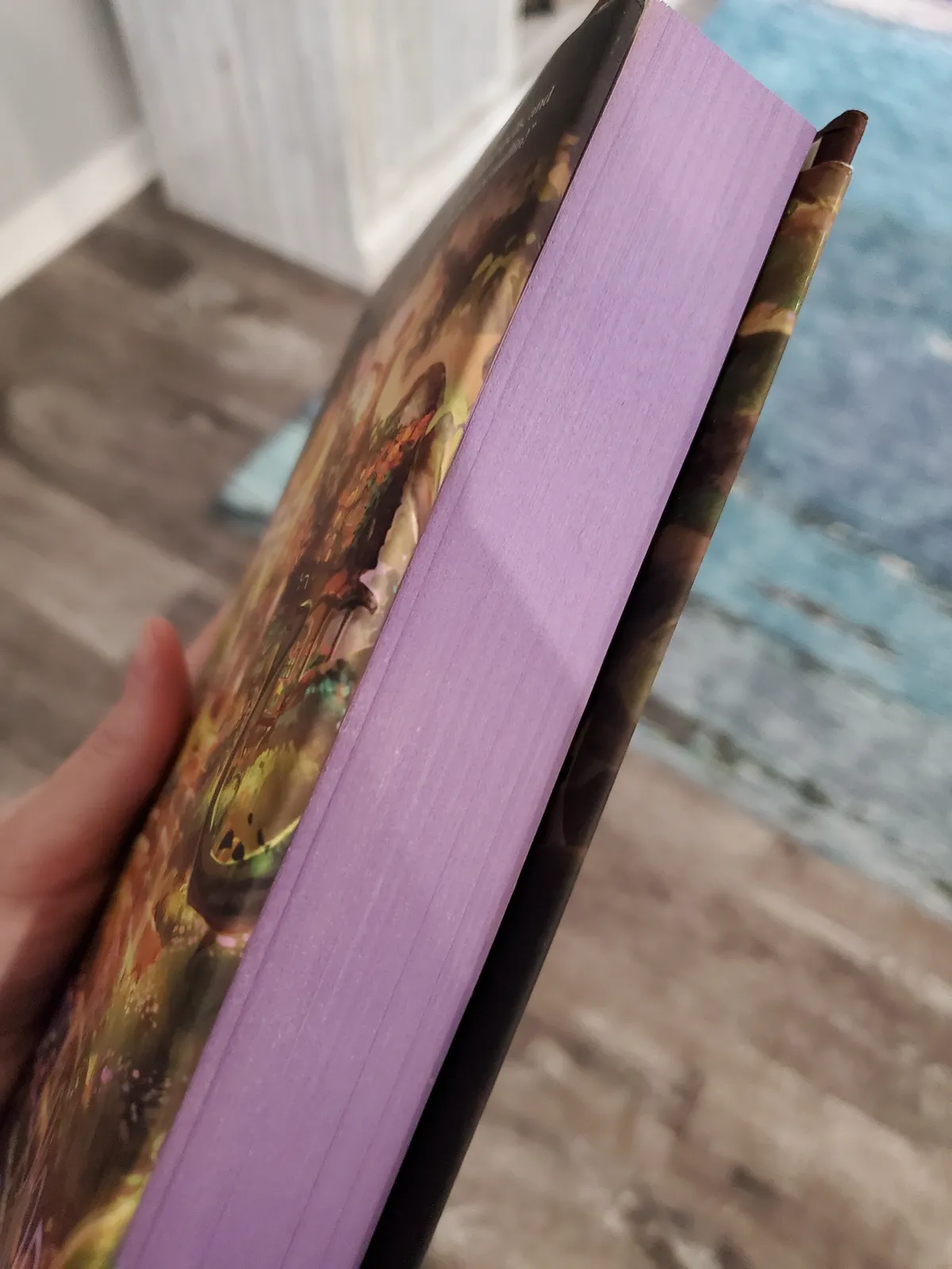 The lavender sprayed edges. This is a hard-cover copy.