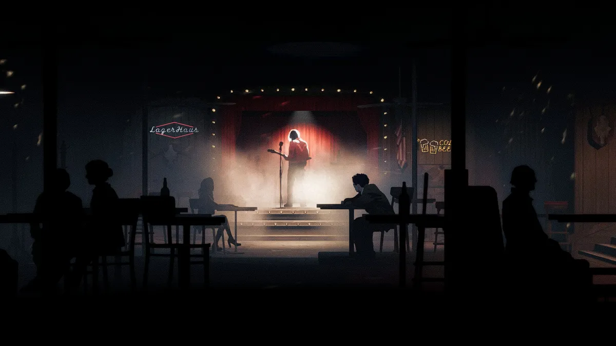 screenshot of a man playing guitar onstage in a bar