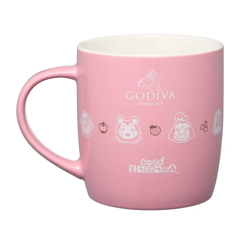 photo of a pink coffee mug with characters from Animal Crossing and a Godiva logo