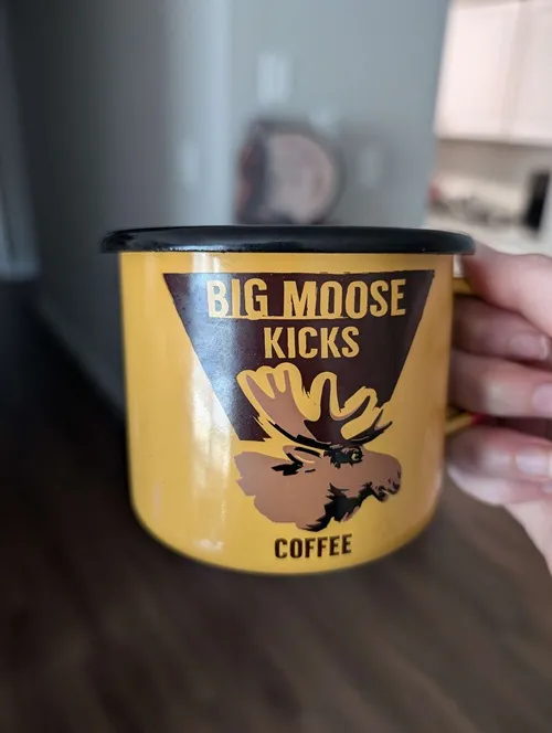 mug featuring the Big Moose Kicks coffee logo from The Long Dark