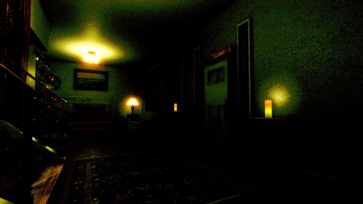 a very dark screenshot of a living room decorated for Christmas