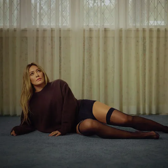 Hilary Duff album cover featuring a photo of herself