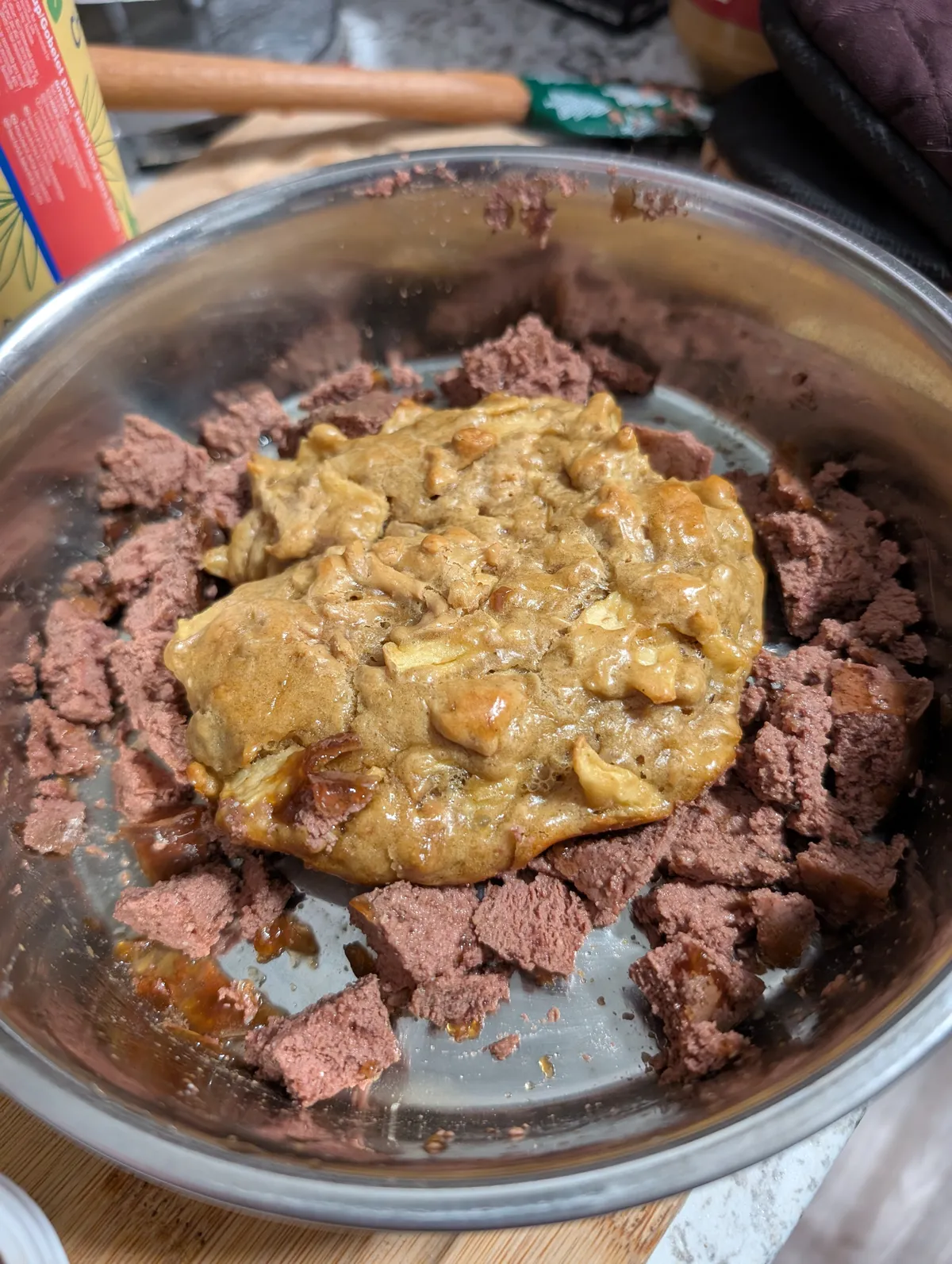 Ranni's birthday cake surrounded by wet food