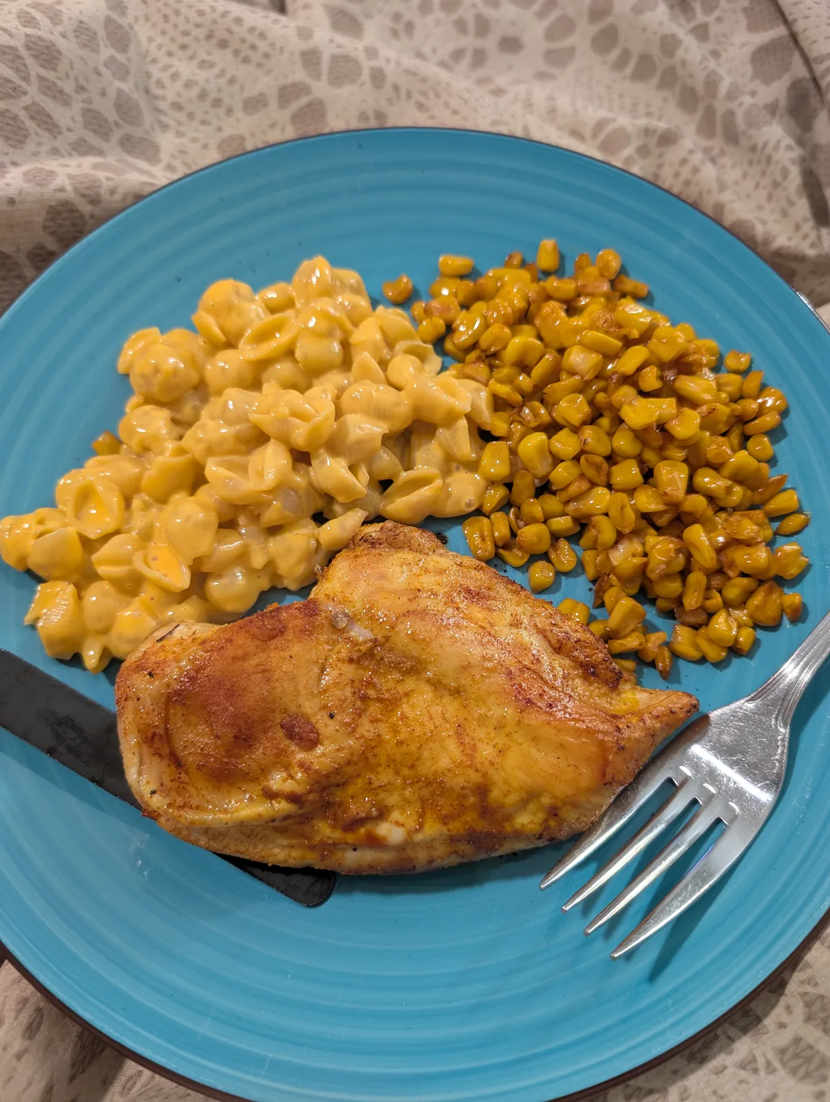 turmeric chicken, mac & cheese, and spicy corn