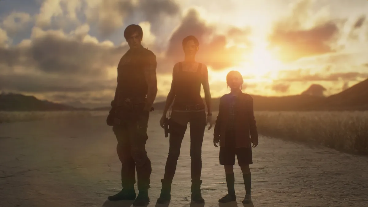 Leon S. Kennedy, Claire Redfield, and Sherry Birkin standing in the desert silhouetted by a sunset