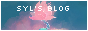 a blue button reading Syl's Blog that features a blooming pink flower in the middle