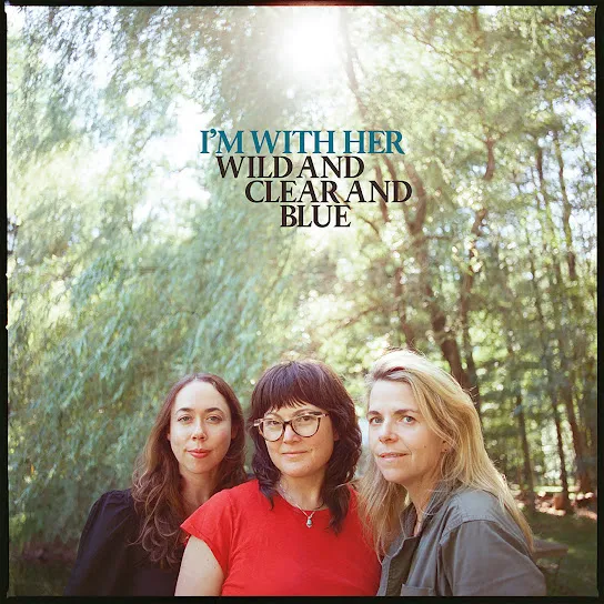 Wild and Clear and Blue album cover featuring the band in a forest
