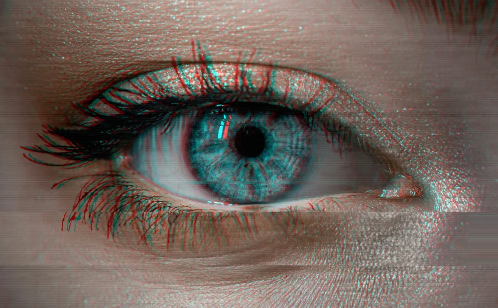 "Closeup of a human eye, with a very blue iris."