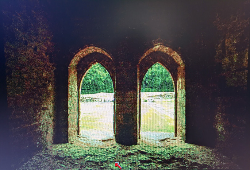 A 32-colour render of the photo after desaturating the walls but nothing else. The render introduces new red and green colour effects instead of rendering the walls grey