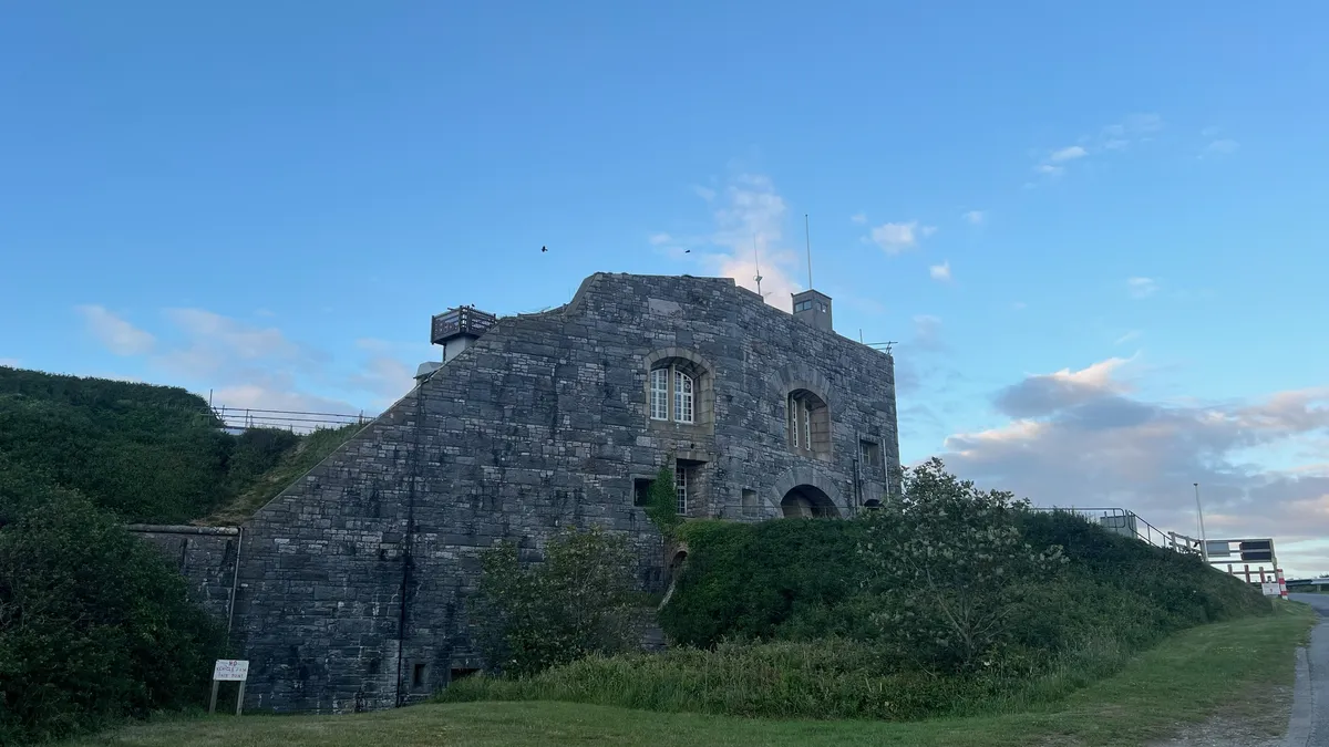 Old fort building with blue skies behind
