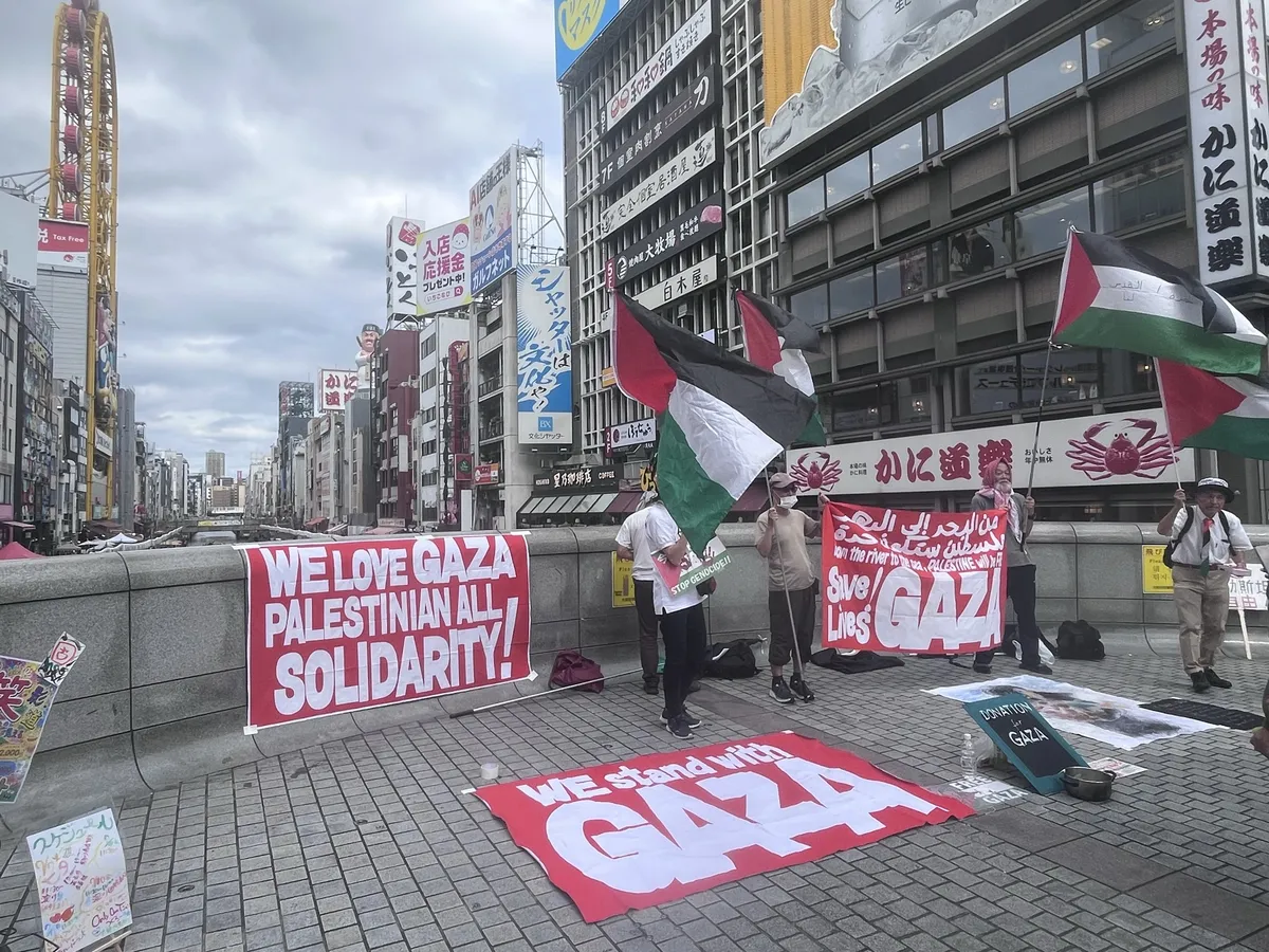 a Palestinian solidarity rally right across from Glico man!