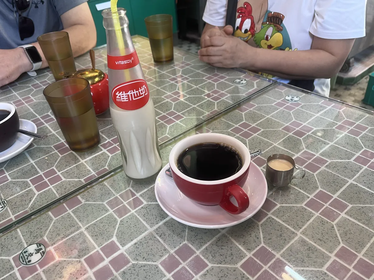 Bottle Vitasoy (soy milk) and black coffee with a classic baby creamer
