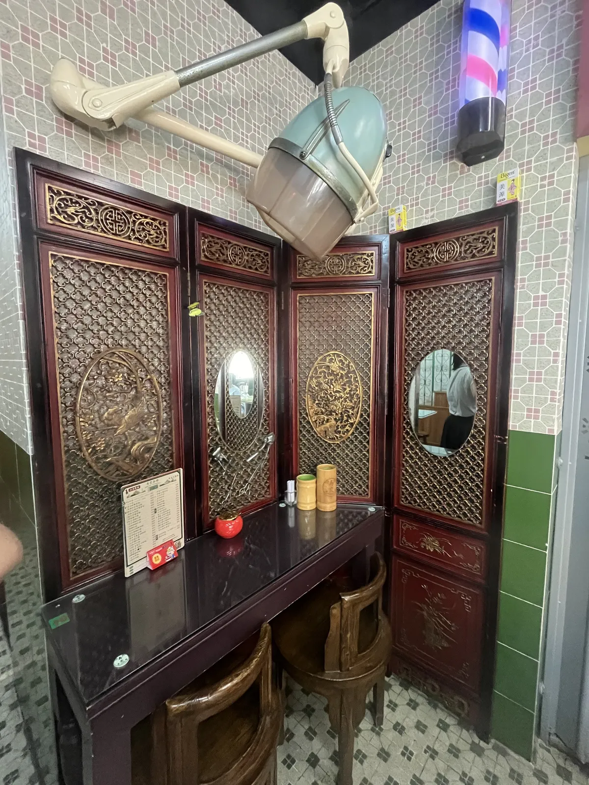 Folding screen and a classic perm machine and barber’s pole for some reason