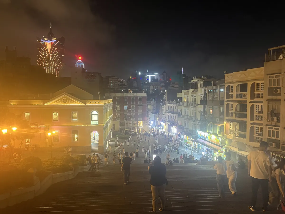 Bobbing and weaving around influencers with their fancy vlogging cameras to snap a photo of the crowd below. We recoup at the Uniqlo at the foot of the hill. Tourist streets lie ahead