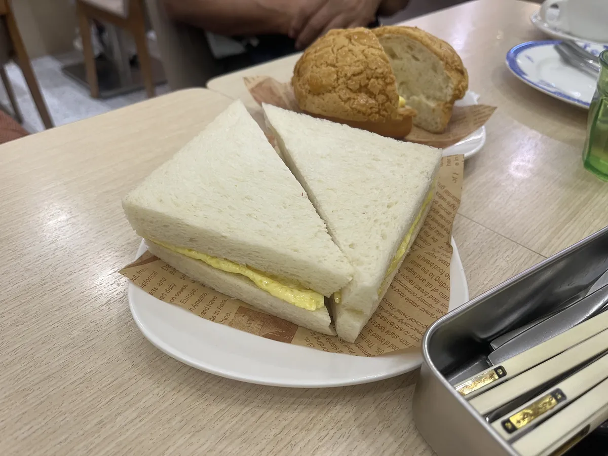 Egg sandwich and pineapple bun with butter (菠蘿油)