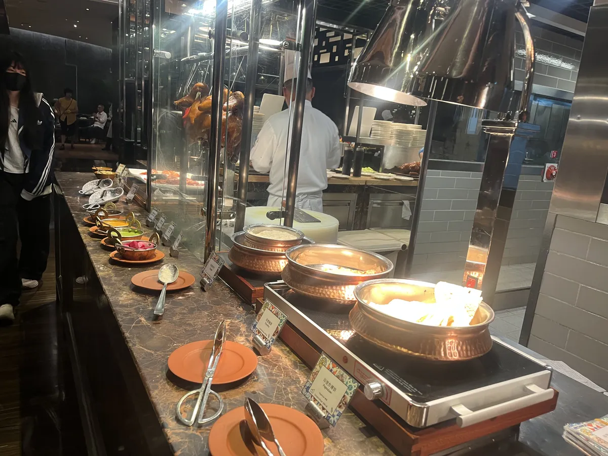 different types of breads for different types of curries—BBQ meats in the middle