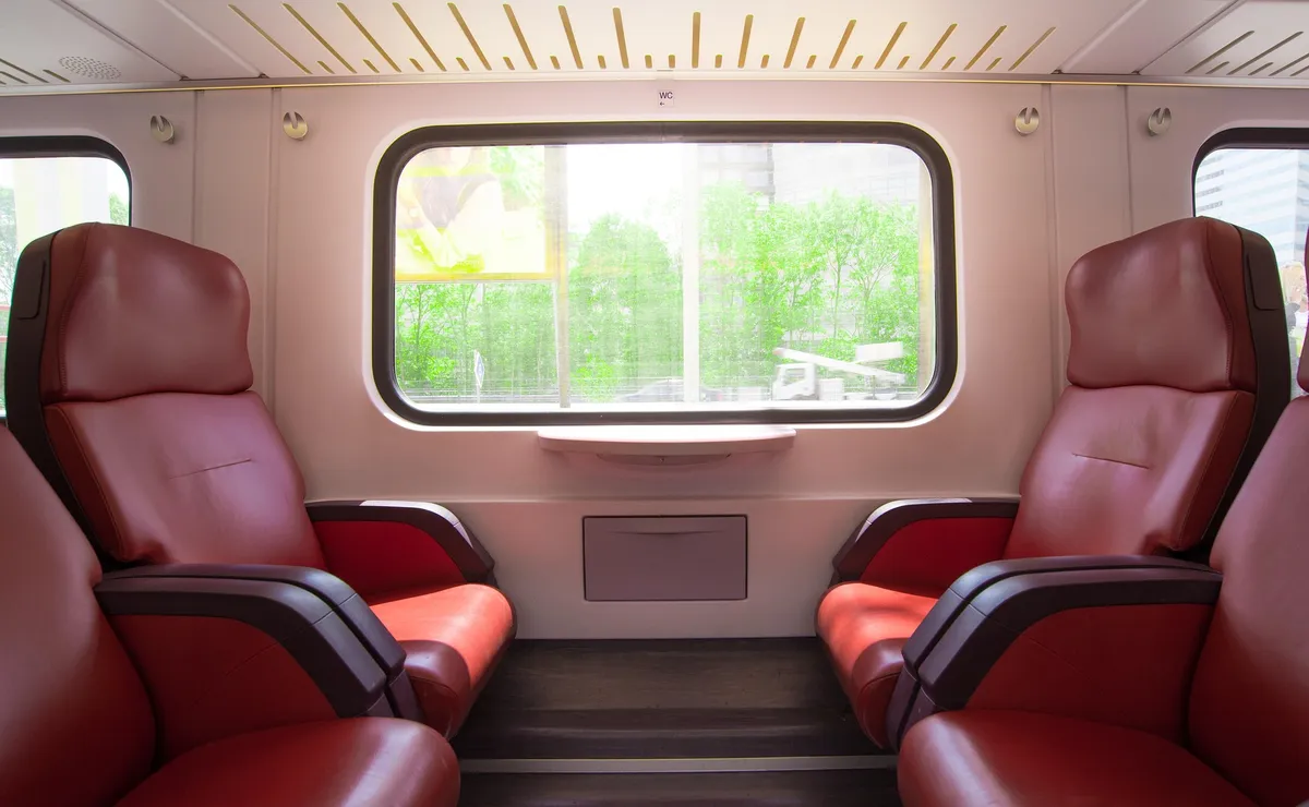 Empty train seats. Image by Rudy and Peter Skitterians from Pixabay