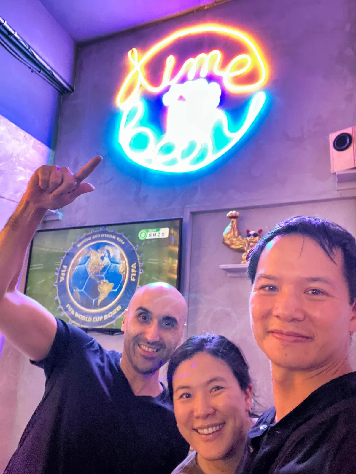 Me and my friends Pat and Diana at a small bar in Raohe Night Market, Taipei