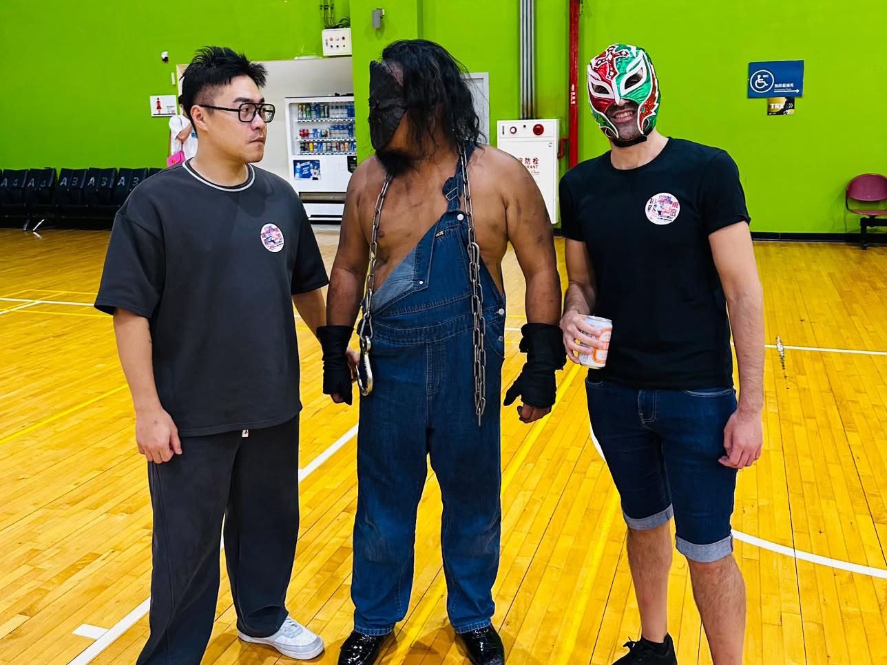 My friend and I posting with Butch, a pro-wrestler