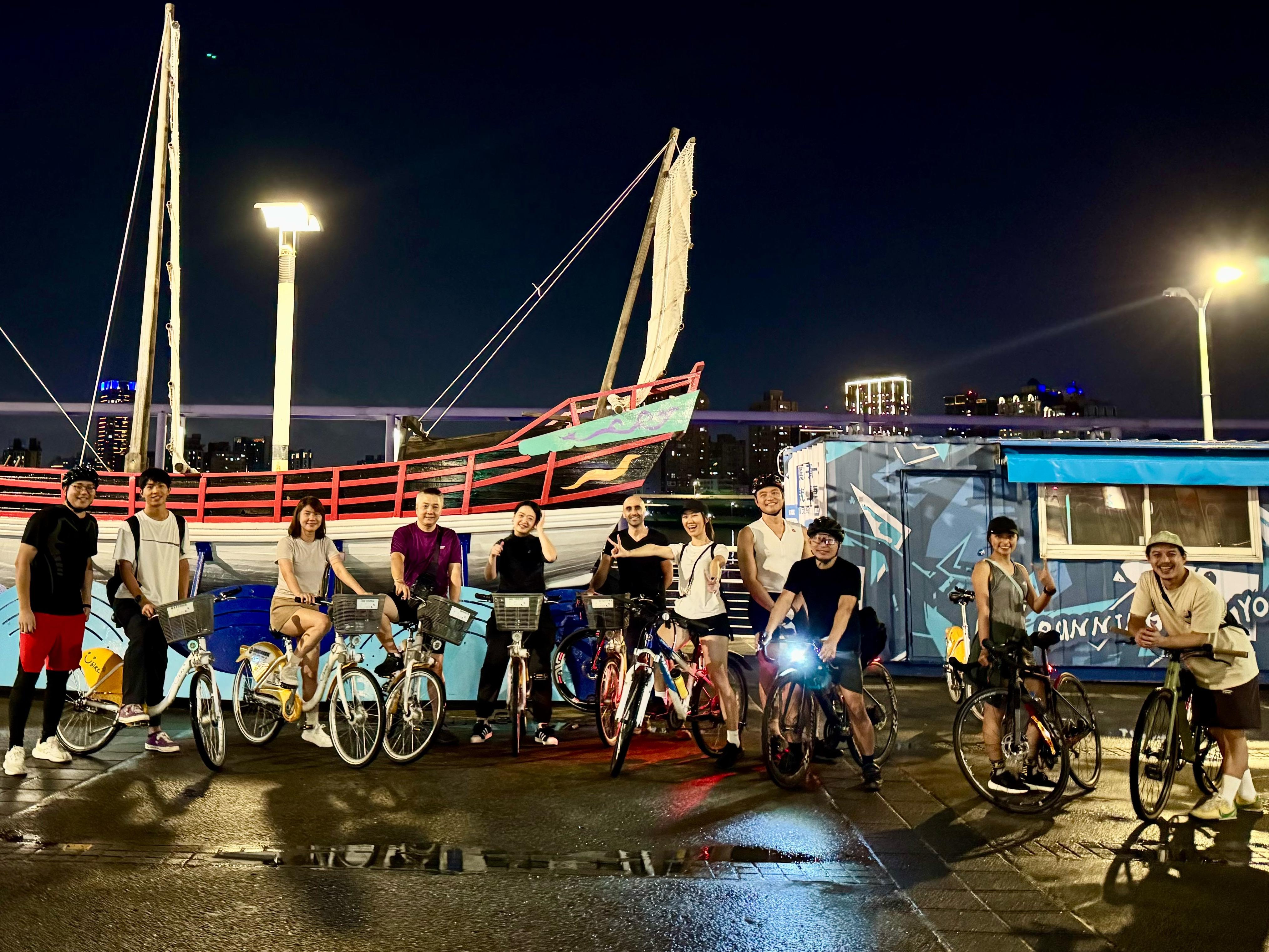 cycling group posing for a pre-ride photo