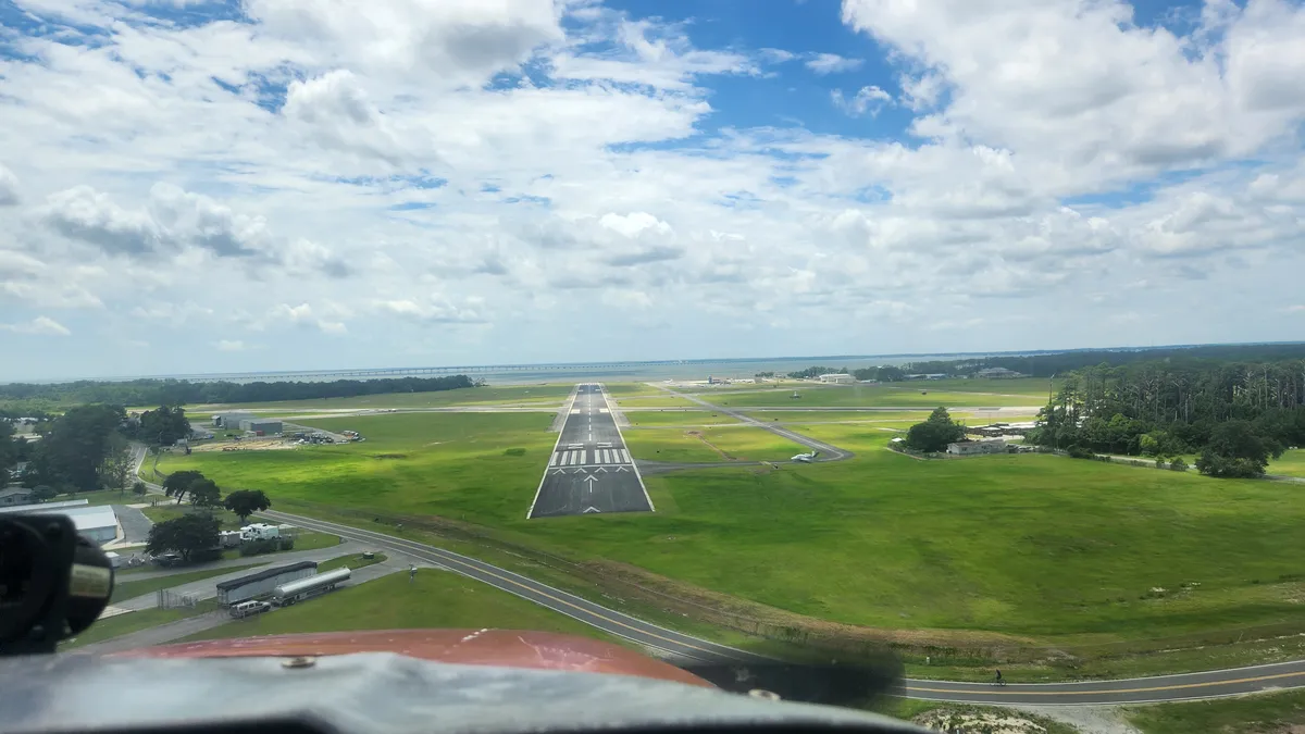 Small airport landing strip view from a plane