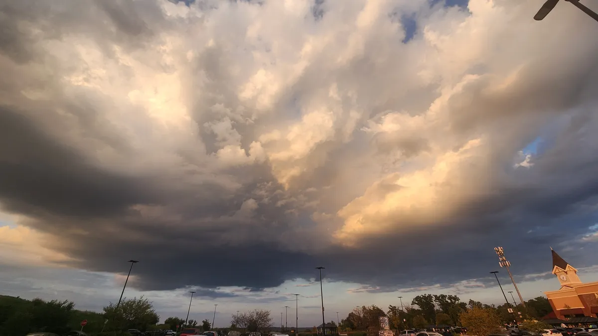 Dramatic display of clouds over a mall parking lot