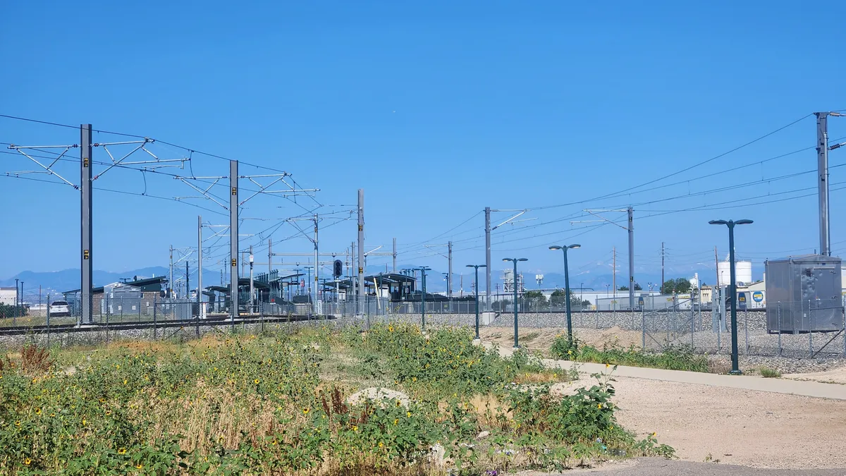 Train station with a mountain range beyond