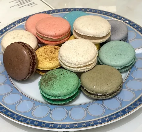 A plate of macarons from Opulence Cafe