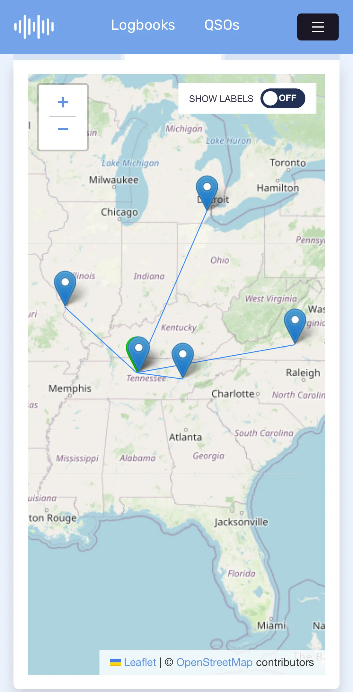 The HAMRS mobile interface, showing a map of a green pin in central Tennessee, with blue pins surrounding it in various other states and lines drawn connecting all blue pins to the green pins. The green pin represents the activator, and the blue pin represents contacts made with other operators.