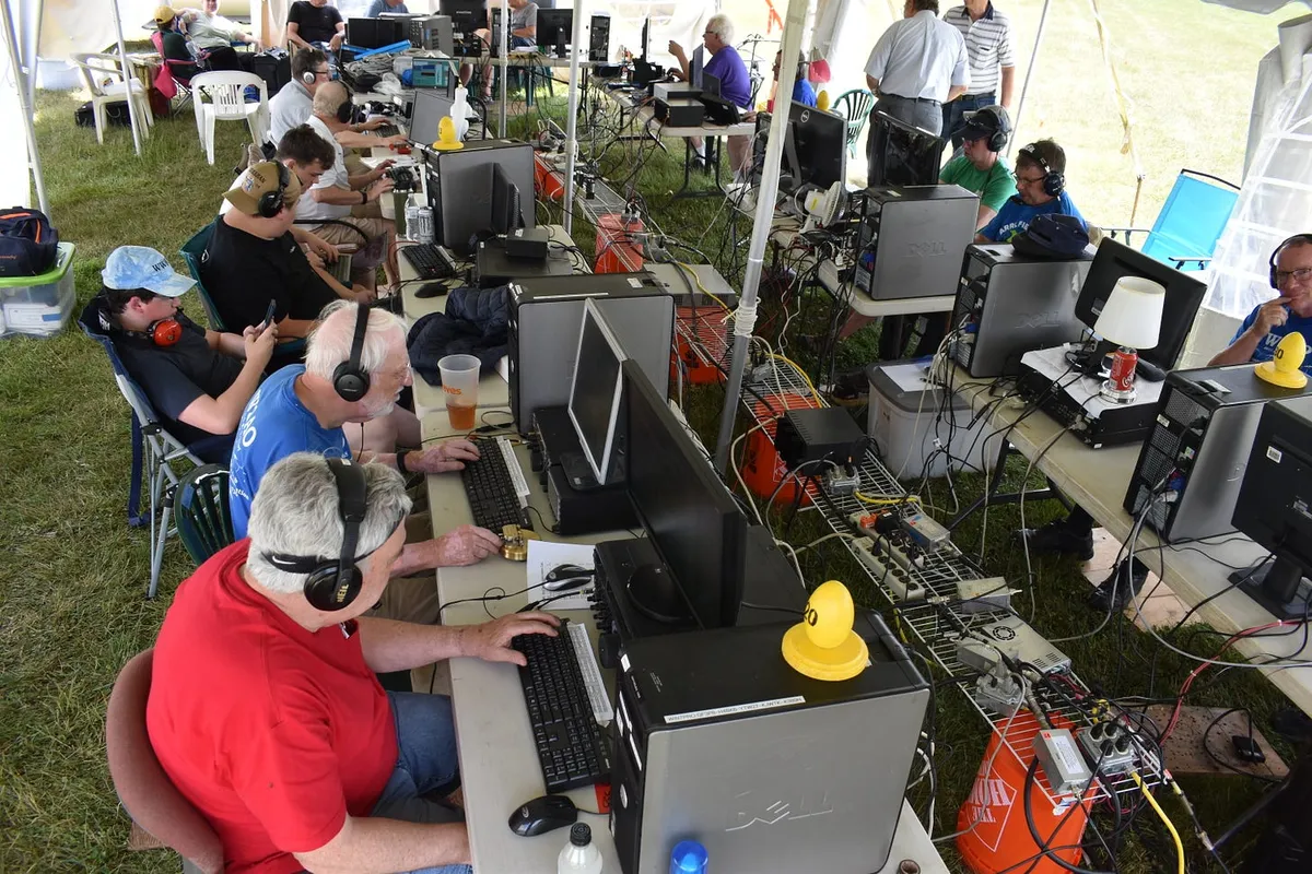 Overhead view of most operating positions, with hams actively making contacts on all bands 10-80m.
