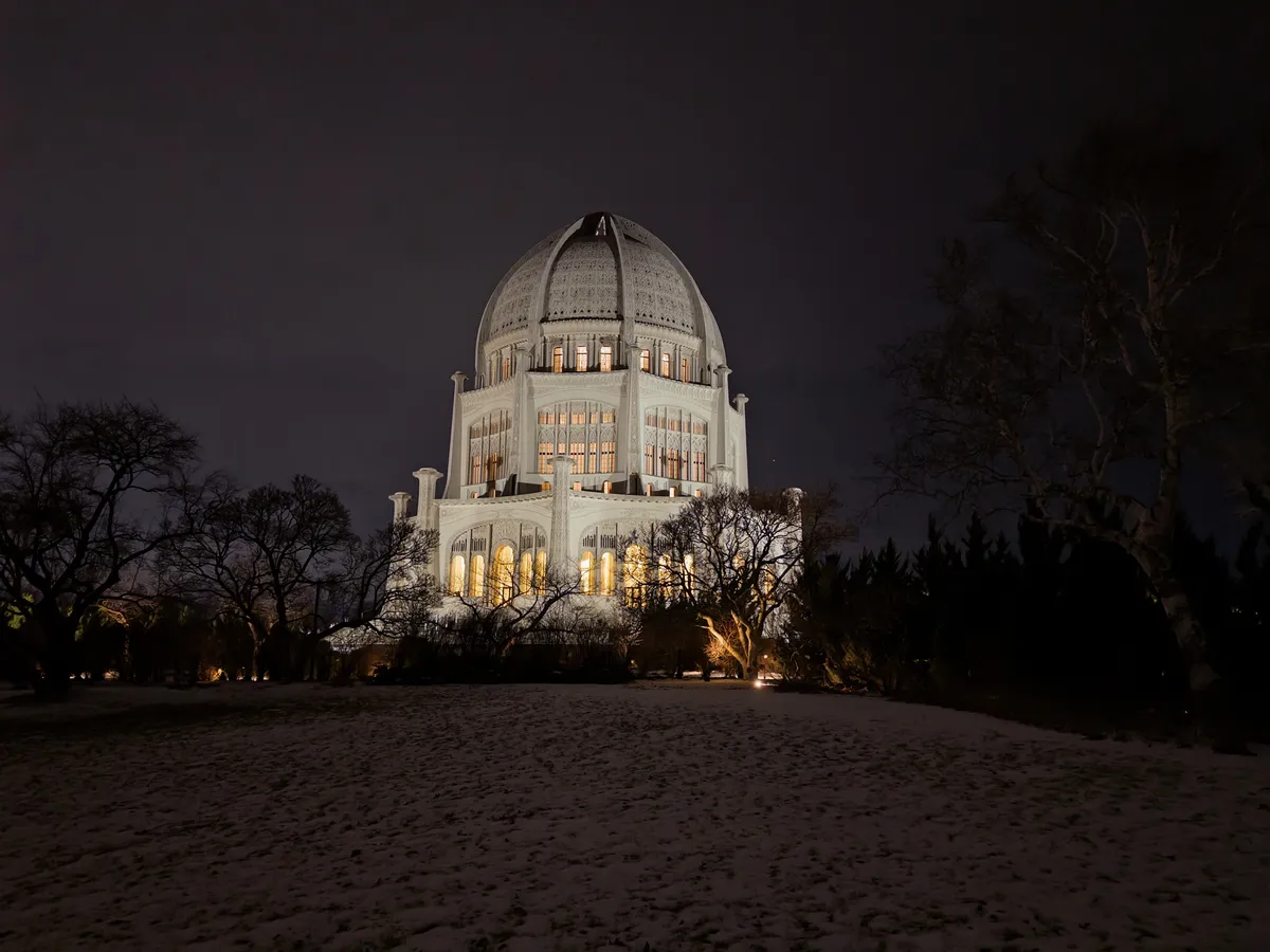 We were not the only folks braving the cold and snow to view this building at night. Bahá'í Temple in Wilmette, IL.