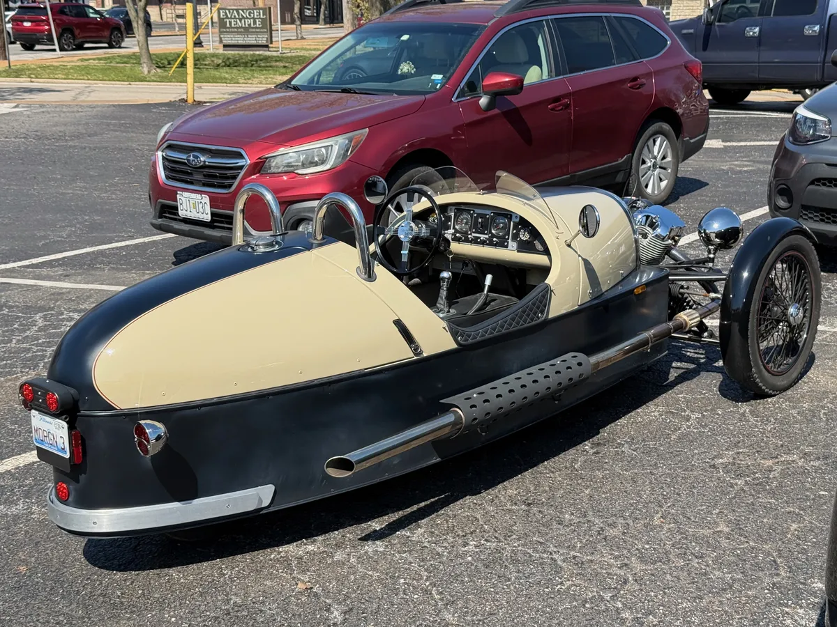A Morgan 3-Wheeler: part car, part motorcycle, part eccentric British motoring.