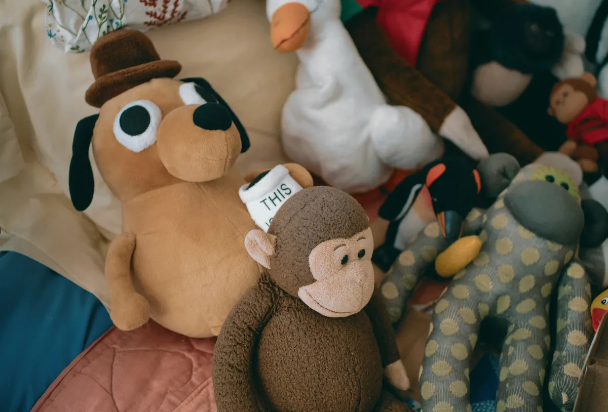 Yes, that’s the Question Hound with his “This Is Fine” coffee mug behind Spunky. Forrest is the polka-dotted monkey beside Spunky, guarding his mega-banana.