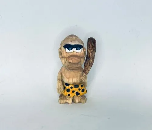 wood-carved-caveman-pf~2