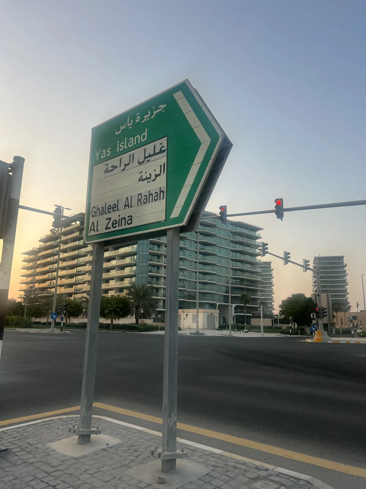 Sign pointing out various locations, including an area called Al Zeina