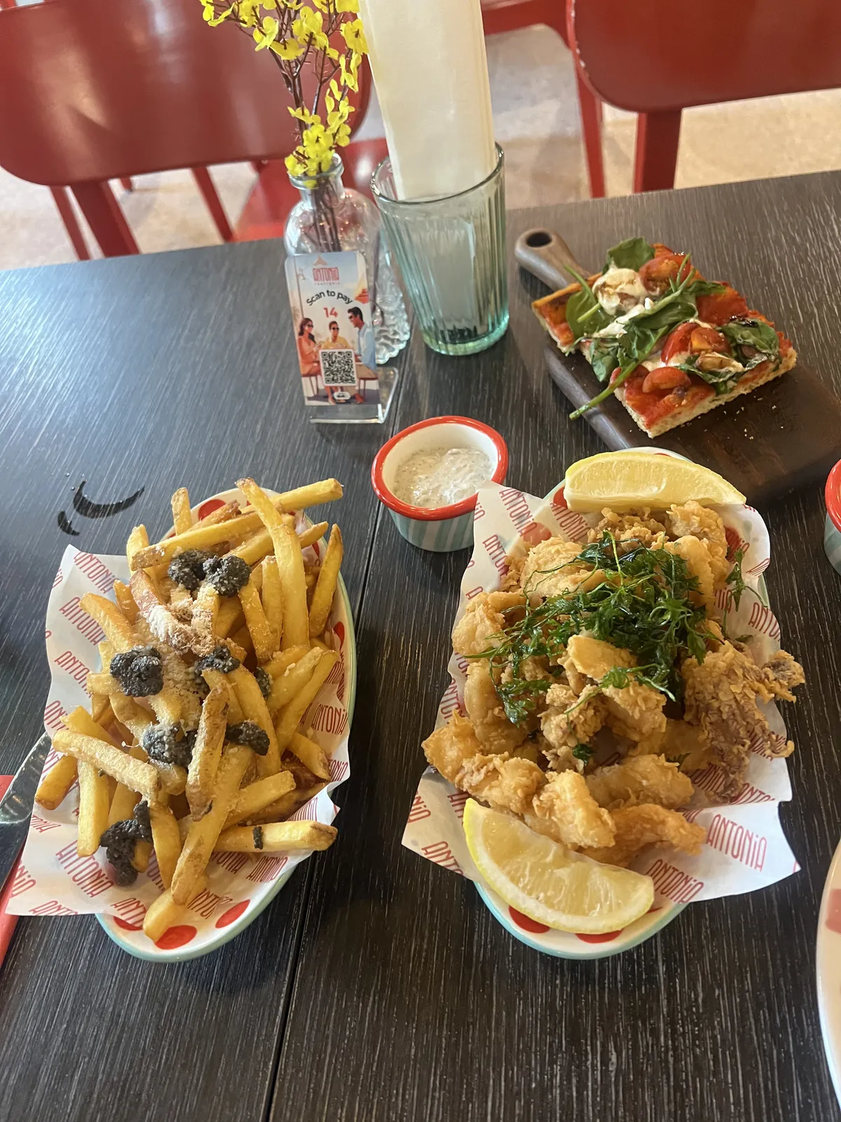 Plates of calamari and truffle chips