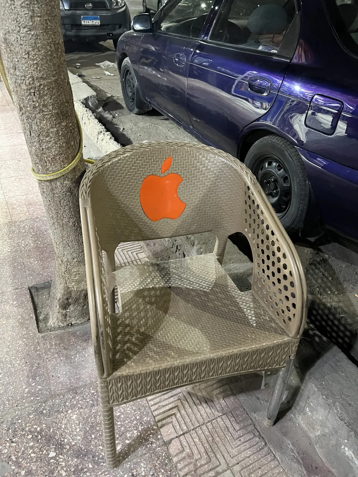 Plastic chair decorated with the Apple logo